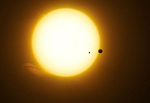 Representación de la estrella Kepler-1625 y un exoplaneta, junto a una luna, pasando delante de ella. Esto es lo que parece haber detectado el Hubble gracias a la técnica de los tránsitos / Dan Durda