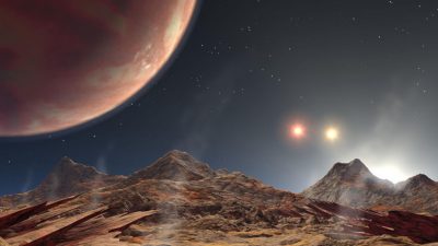 Astrónomos descubren un peculiar y cercano exoplaneta con tres soles rojos brillantes