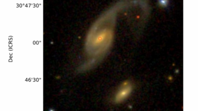 Observan una superburbuja en una galaxia interactiva
